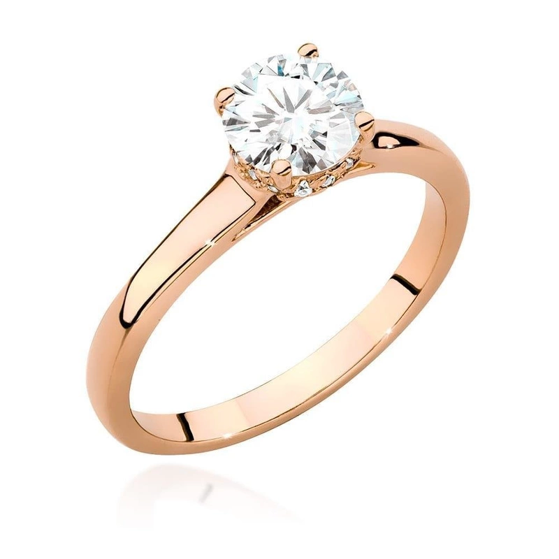 Złoty pierścionek na zaręczyny różowe złoto 585 kamienie w koronie  brylant 0,7 ct