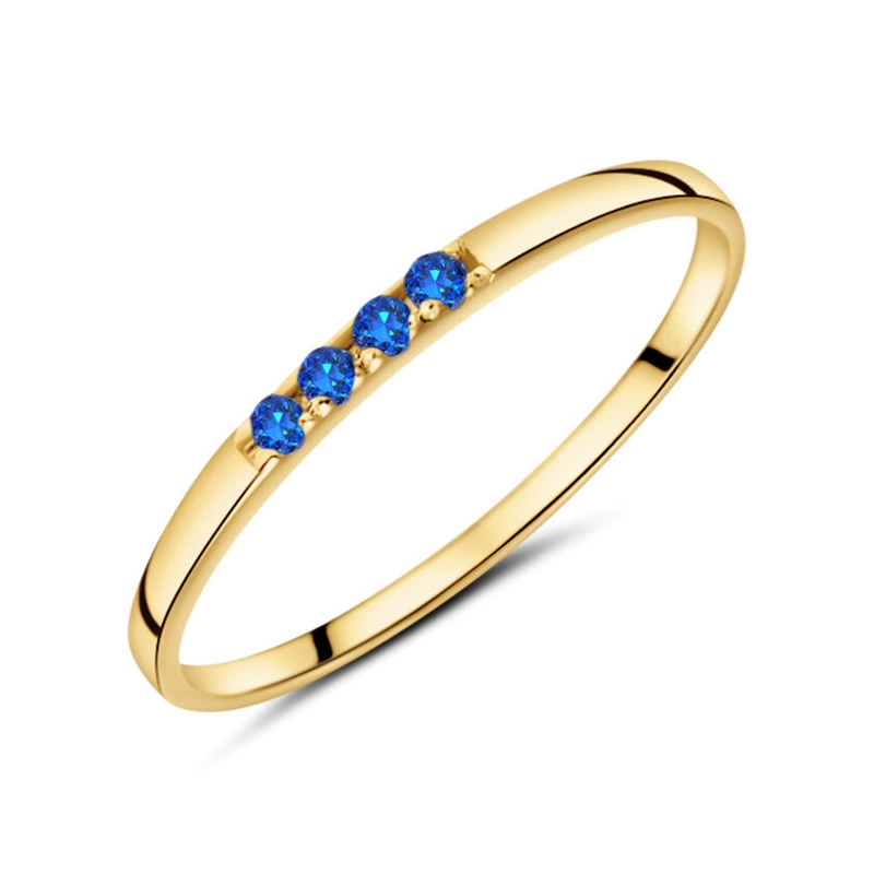 Złoty pierścionek obrączka 585 niebieskie cyrkonie