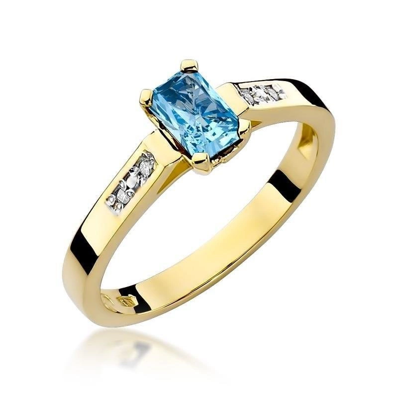 Złoty pierścionek zaręczynowy 585 z diamentami i topazem 0,65 ct bagietka