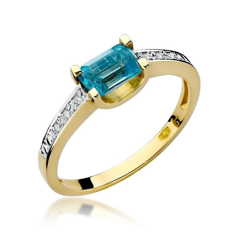 Złoty pierścionek zaręczynowy z diamentami i topazem 0,65 ct